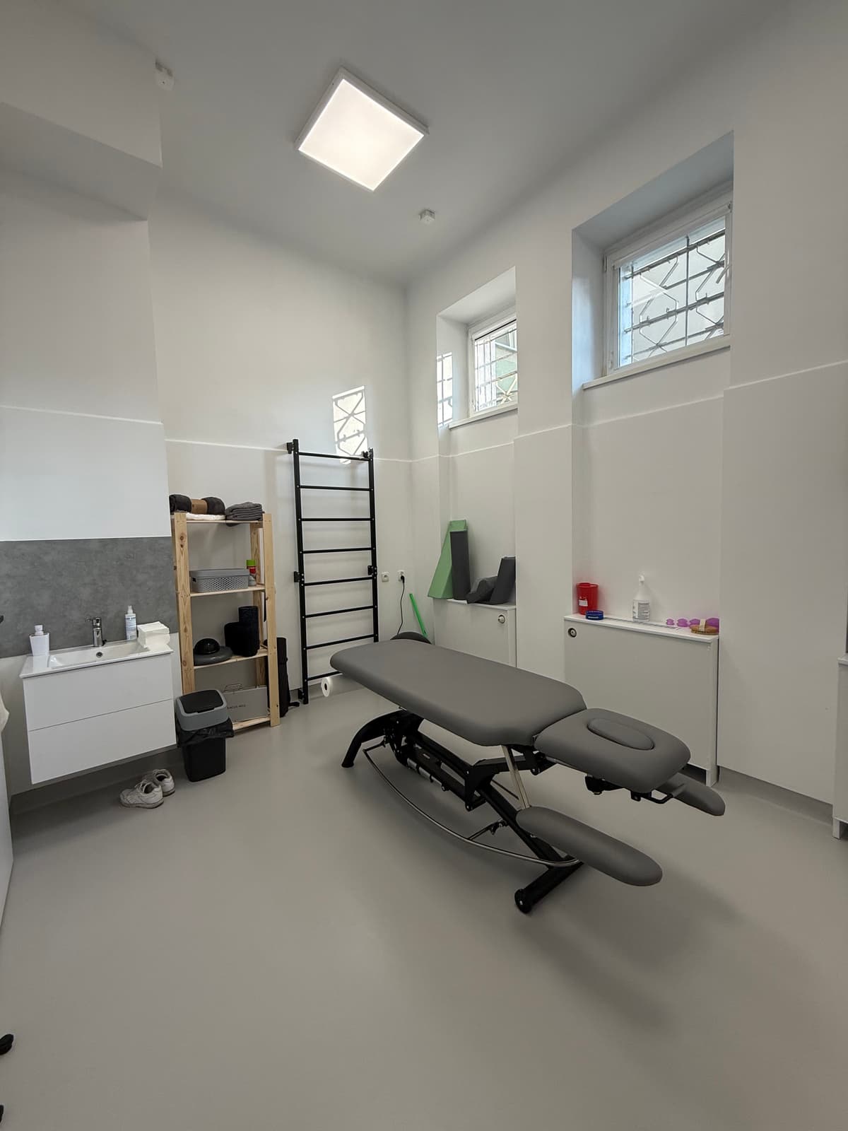 Professional physical therapist working with a patient during rehabilitation session